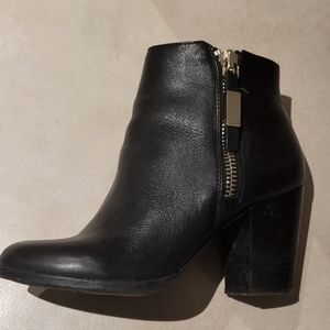 Black leather Aldo heel bootie with gold hardware